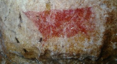 Representación acéfala de la cueva de Les Pedroses. © Javier Fortea, Principado de Asturias, Consejería de Cultura